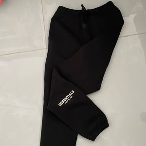 Brand new ESSENTIALS sweat-pant in black.  Never worn Size: KIDS XXL 14/16